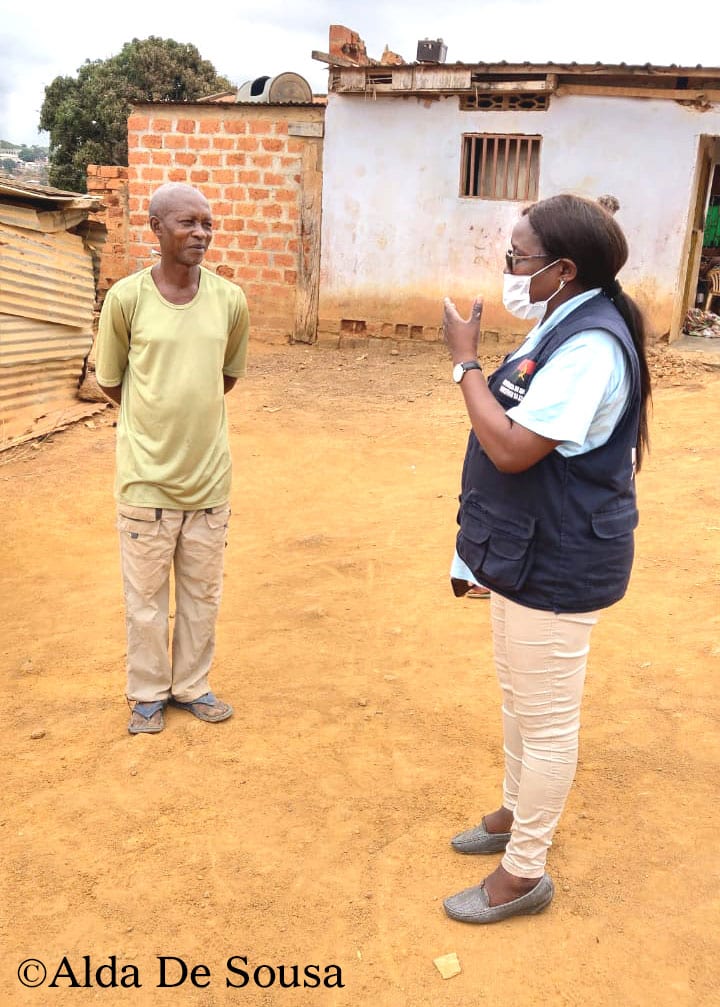 Dr-DeSousa-speaks-community-member-Angola