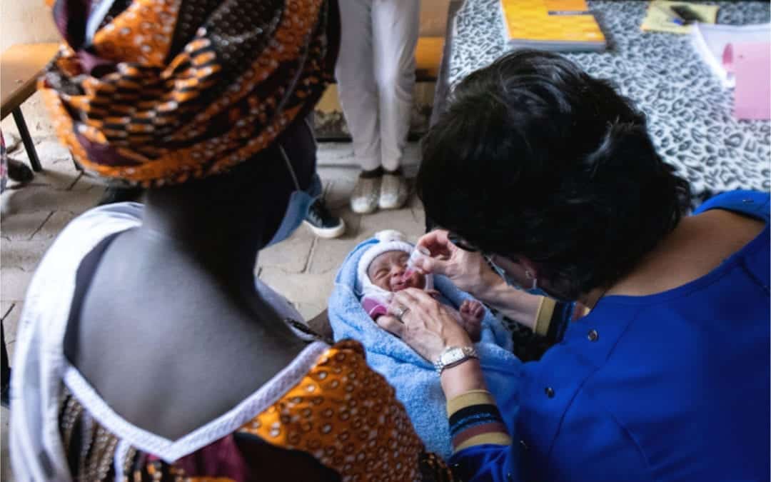 Young child being vaccinated by Female Vaccinators in Chad