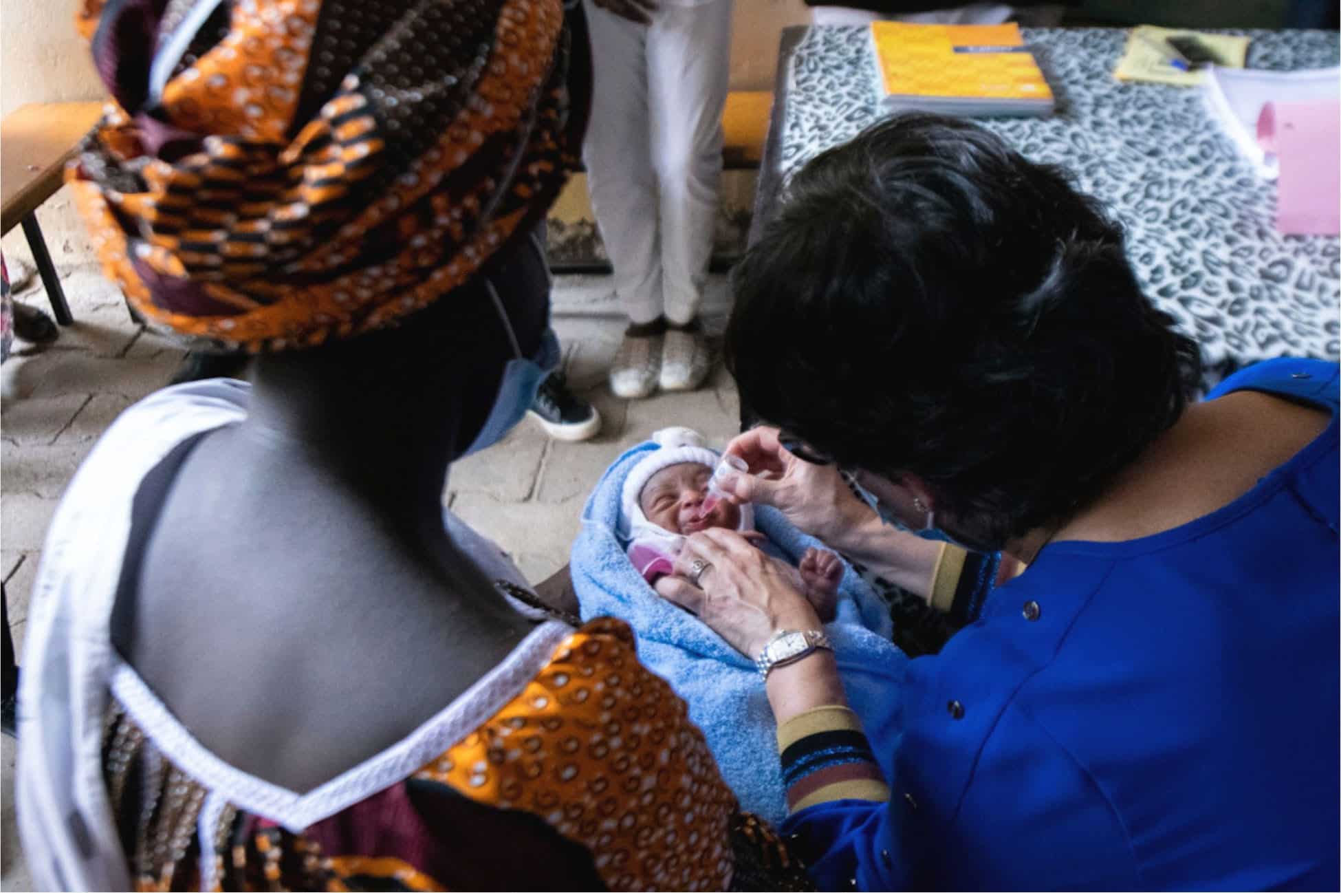 A young child being vaccinated by one of our amazing Female Vaccinators in Chad